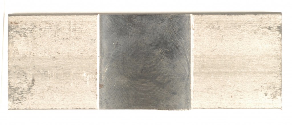 No letters or numbers of the serial number are visible